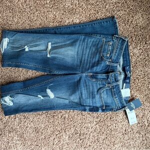Hollister low rise boot cut distressed jeans. NWT. Size 1L.